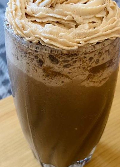 Mocha Cookie Frozen Coffee with Coffee Whipped Cream.