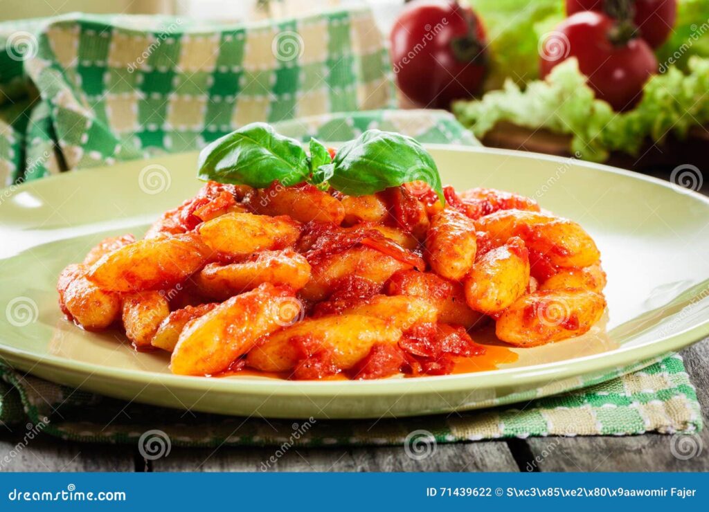 Fluffy Pillow of Heaven: Perfect Italian Gnocchi with Vibrant Tomato Sauce